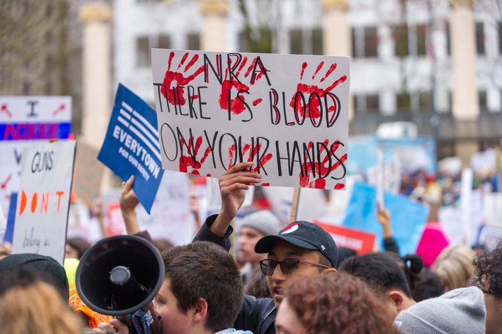 PORTLAND, OR - MARCH 24, 2018: Protesters denounce the NRA (National Rifle Association) to protest school shootings and to demand gun control during the March for Our Live on March 24, 2018, in downtown Portland, OR. (Photo by Diego Diaz/Icon Sportswire via Getty Images)
