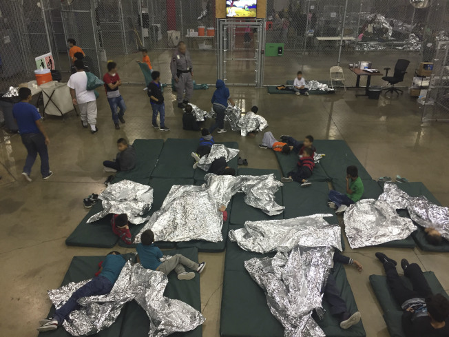 This US Customs and Border Protection photo obtained June 18, 2018 shows intake of illegal border crossers by US Border Patrol agents at the Central Processing Center in McAllen, Texas on May 23, 2018. / AFP PHOTO / US Customs and Border Protection / Handout / RESTRICTED TO EDITORIAL USE - MANDATORY CREDIT "AFP PHOTO / US CUSTOMS AND BORDER PROTECTION/HANDOUT" - NO MARKETING NO ADVERTISING CAMPAIGNS - DISTRIBUTED AS A SERVICE TO CLIENTS HANDOUT/AFP/Getty Images