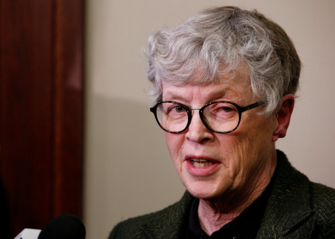 Michigan State University (MSU) President Lou Anna Simon speaks after being confronted by victims during a break at the sentencing hearing for Larry Nassar, a former team USA Gymnastics doctor who pleaded guilty in November 2017 to sexual assault charges, in Lansing, Michigan, U.S., January 17, 2018. REUTERS/Brendan McDermid